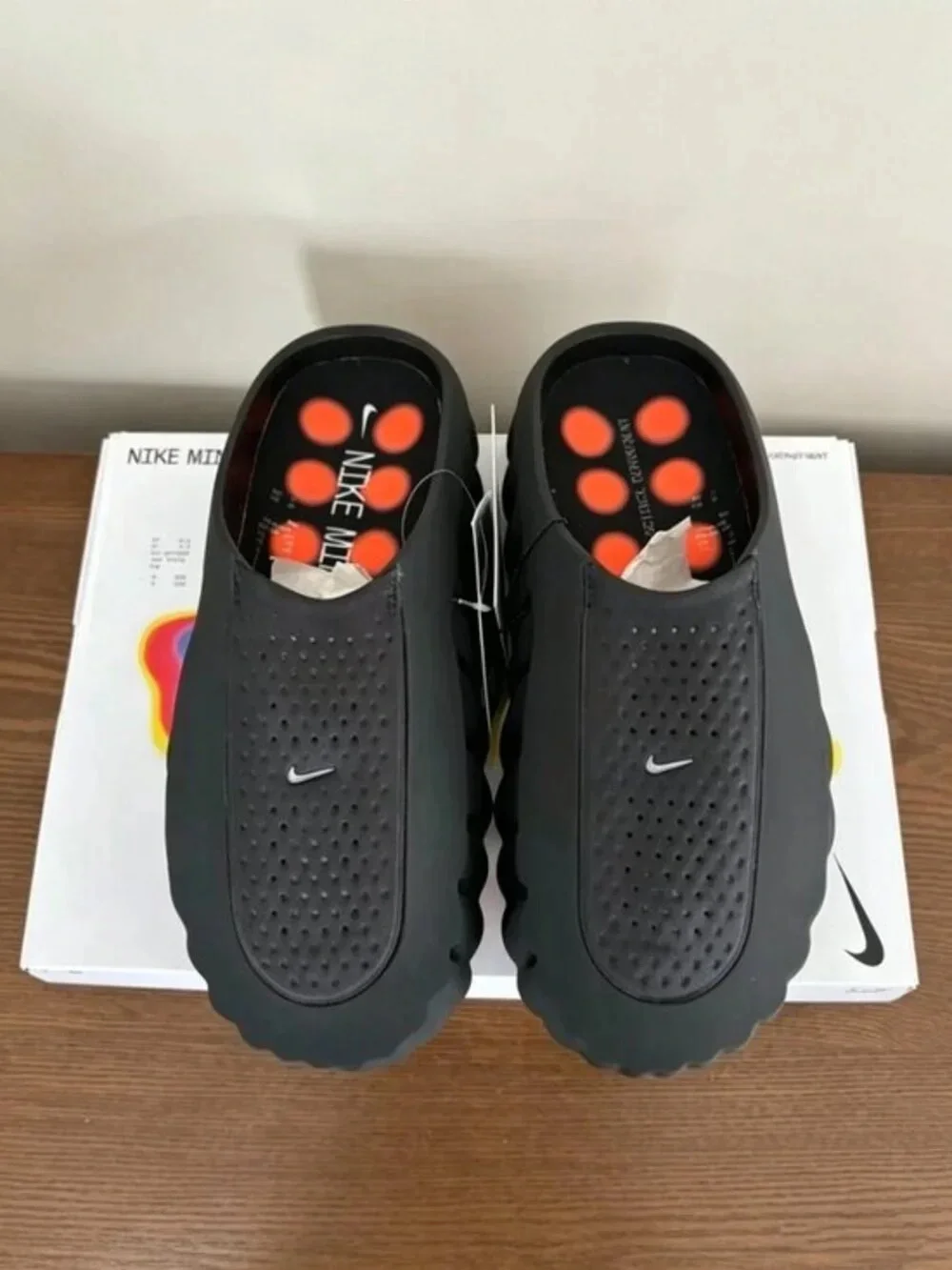 Nike Black Slide Sandals with Orange Pod Accents